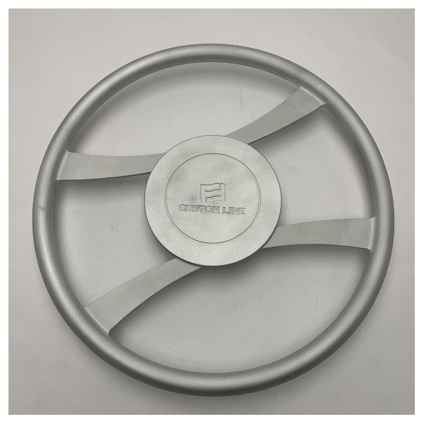 The Custom Line 550 mm FFCL120 is an anodized steering wheel with a logo.